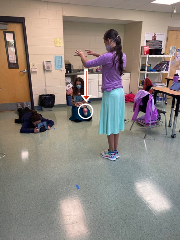 Testing gravity by dropping two balls of different masses